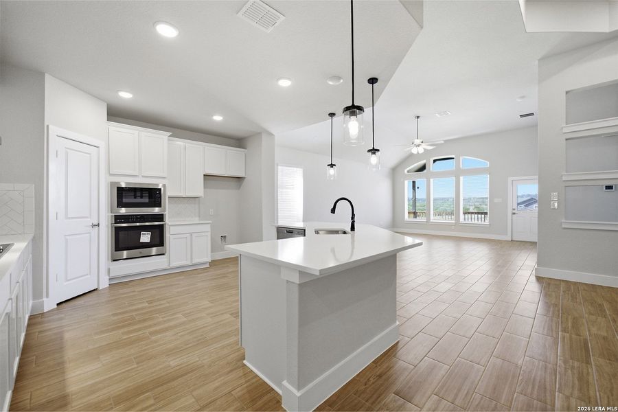 Furnished interior view inside a new home in The Woodlands at Medina Hills, Mico (Image 15).