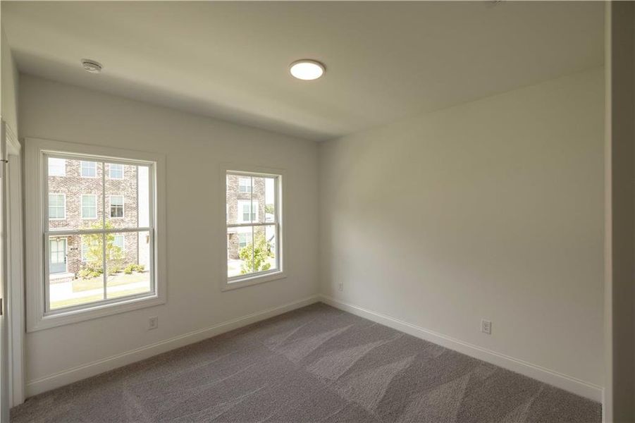 Spacious, unfurnished interior of a new home in Palisades Townhomes, Cumming (Image 23). Spacious, unfurnished interior of a new home in Palisades Townhomes, Cumming (Image 23).