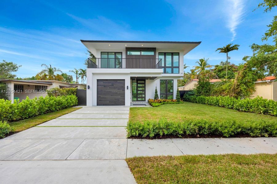 Front exterior of a new home in , Miami, FL, highlighting curb appeal (Image 27).