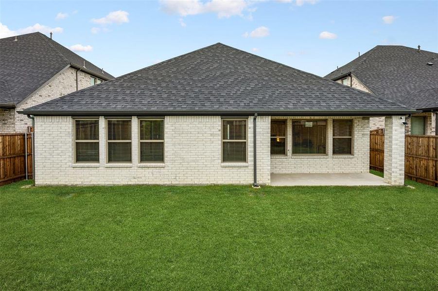 Exterior details and patio area of a home in LakePointe, Lavon (Image 3).