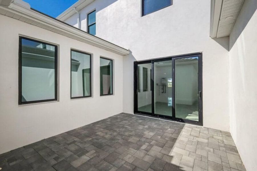 Exterior details and patio area of a home in Aqua, Bradenton (Image 13).