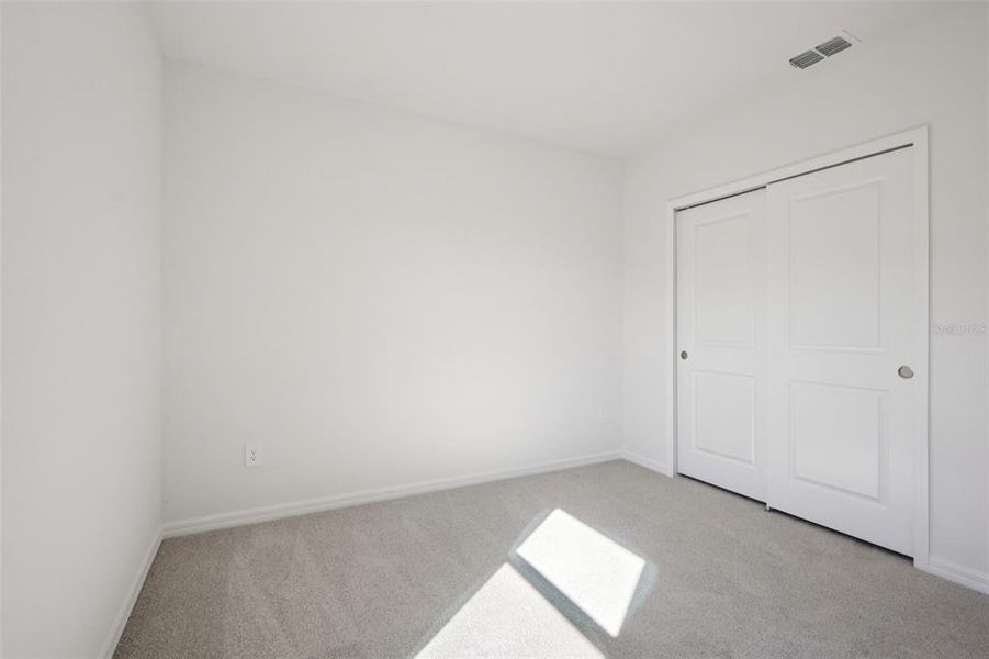 Spacious, unfurnished interior of a new home in Leyland Preserve - Classic Series, Brooksville (Image 29).