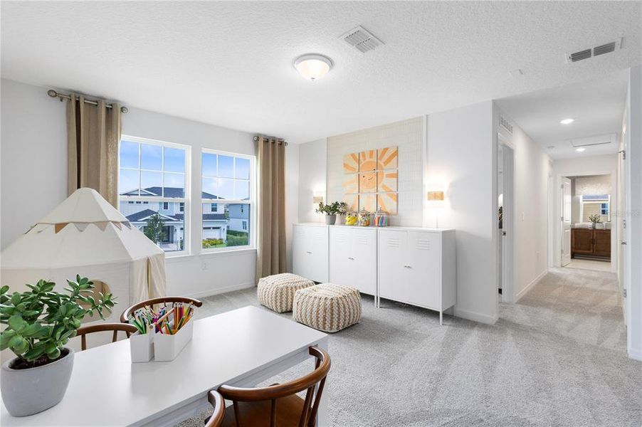 Furnished interior view inside a new home in EverBe, Orlando (Image 16).