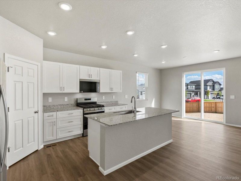 Furnished interior view inside a new home in Ridgeline Vista: The Flora Collection, Brighton (Image 4). Furnished interior view inside a new home in Ridgeline Vista: The Flora Collection, Brighton (Image 4).