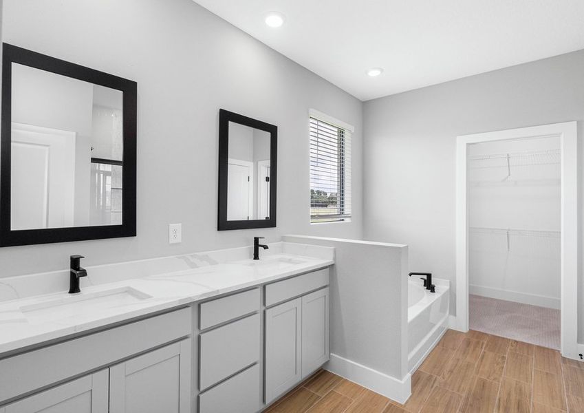Get ready for your day in the master bathroom