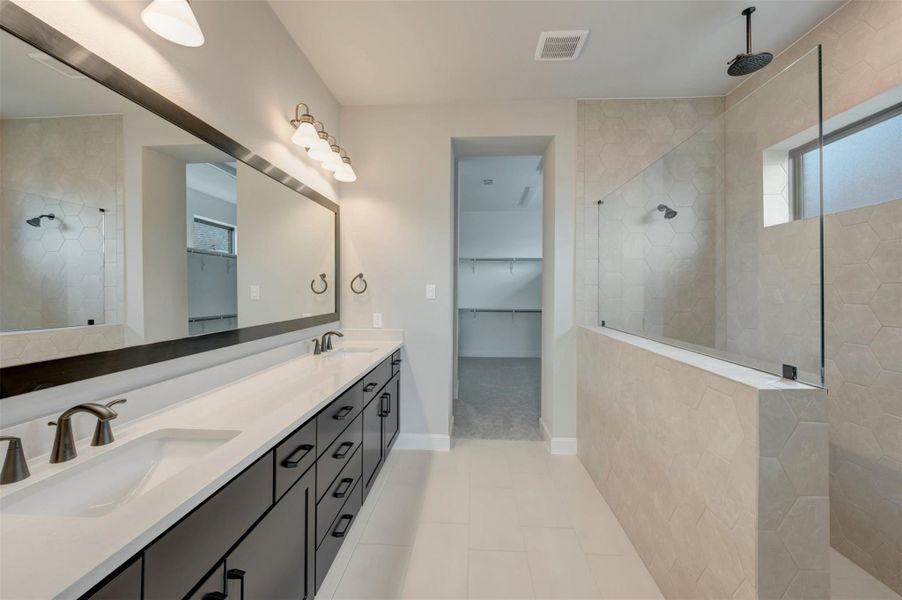 Furnished interior view inside a new home in Harvest Green 65', Richmond (Image 12).