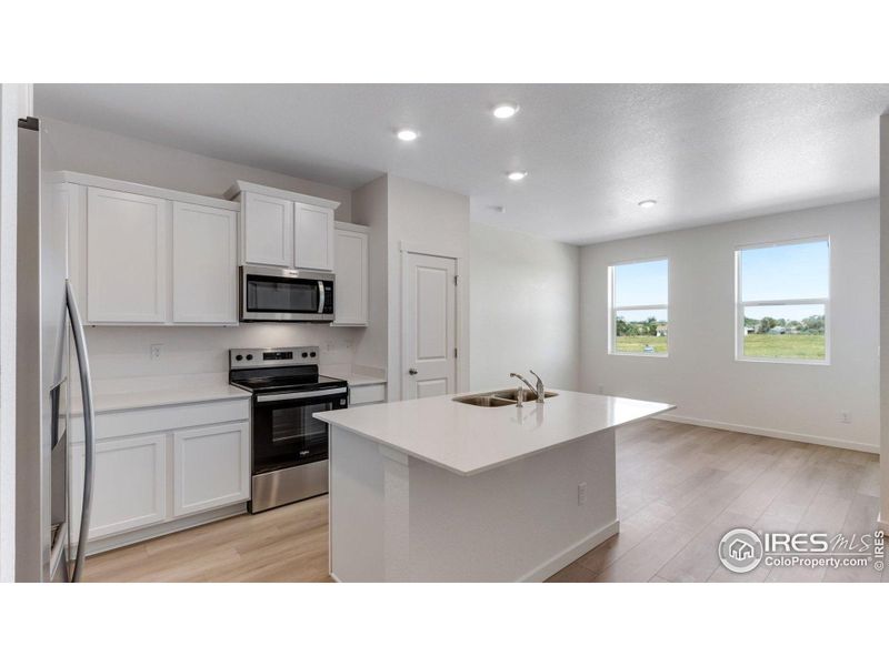 Furnished interior view inside a new home in Vista Meadows, Fort Lupton (Image 4).
