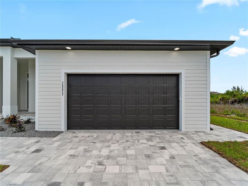 Front exterior of a new home in , Port Charlotte, FL, highlighting curb appeal (Image 32). Front exterior of a new home in , Port Charlotte, FL, highlighting curb appeal (Image 32).