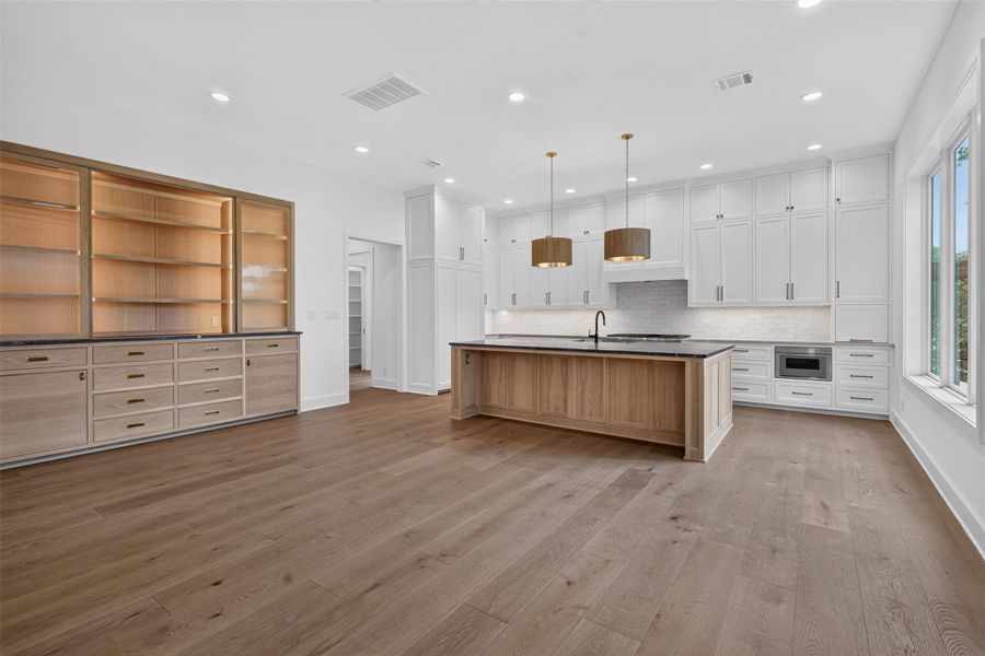 Furnished interior view inside a new home in , The Woodlands (Image 7).