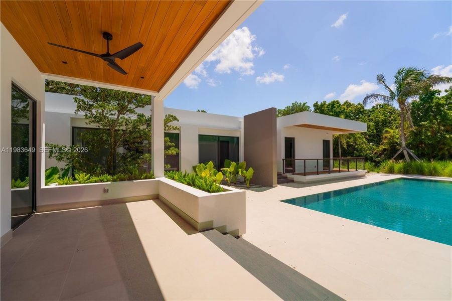 Exterior details and patio area of a home in , Pinecrest (Image 10). Exterior details and patio area of a home in , Pinecrest (Image 10).