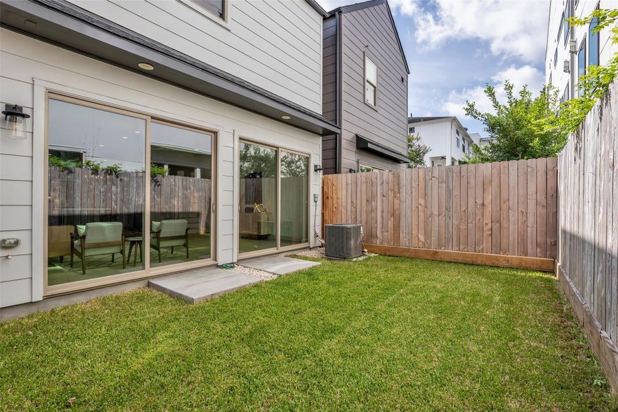 The outdoor patio is fully enclosed, providing a private and comfortable space for relaxing, entertaining, or enjoying the outdoors.