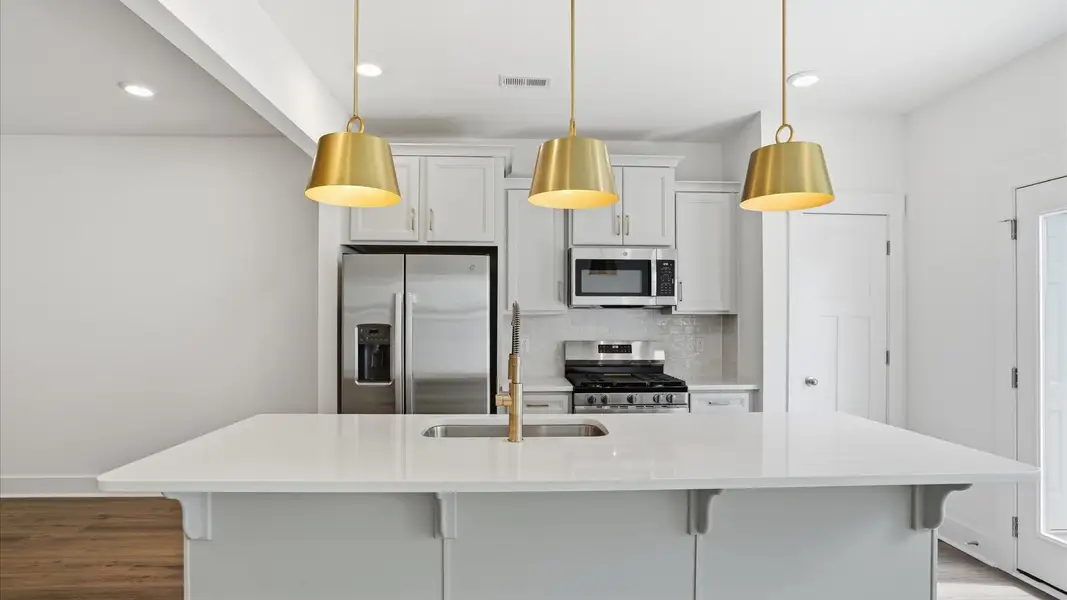 Elegant kitchen with modern finishes in this first-class villa at Marion Square near Downtown Greenville, SC