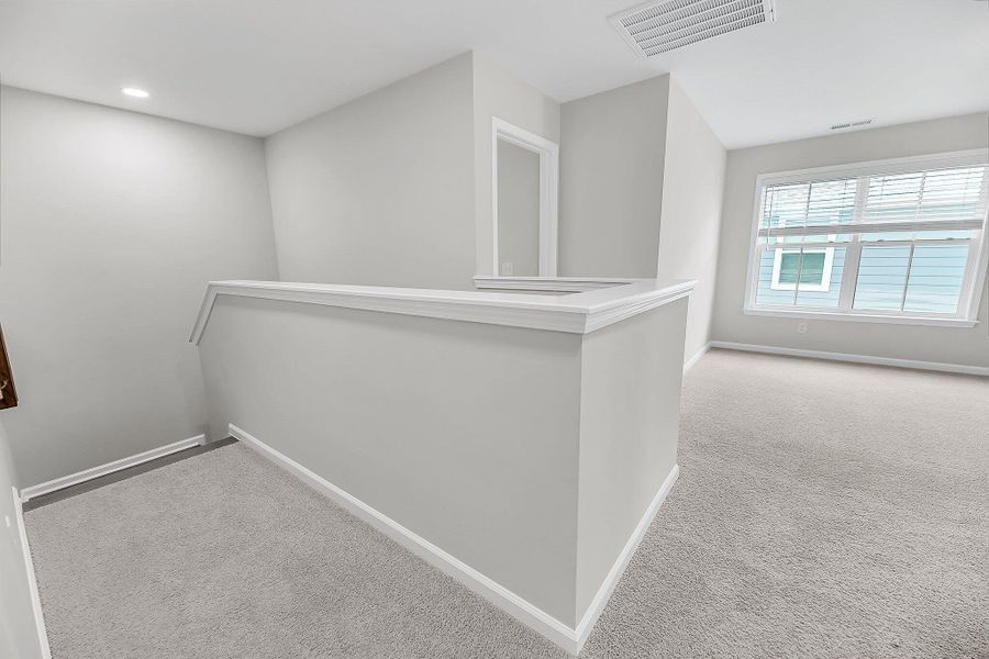 Spacious, unfurnished interior of a new home in Sweetgrass Station, Summerville (Image 36).