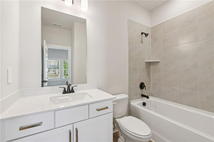 Furnished interior view inside a new home in Vines at Mill Creek - Estate Series, Braselton (Image 20).