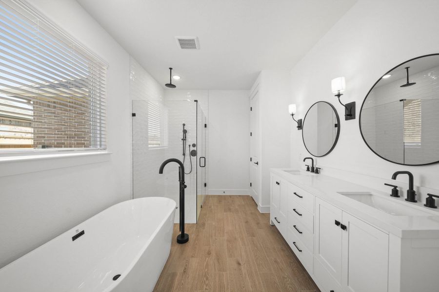 Luxurious primary bath (*Photo not of actual home and used for illustration purposes only.)