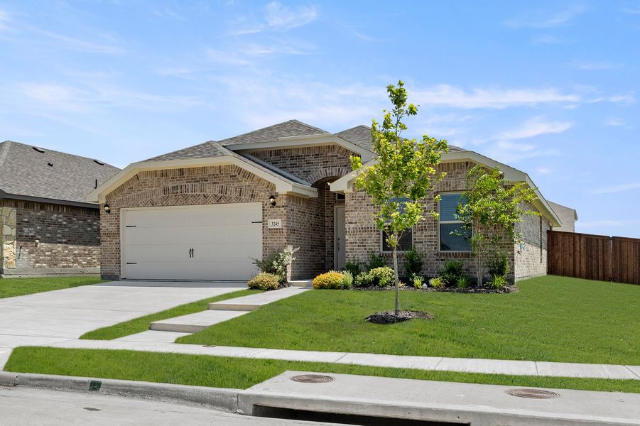 Front exterior of a new home in De Berry Reserve, Royse City, TX, highlighting curb appeal (Image 2). Front exterior of a new home in De Berry Reserve, Royse City, TX, highlighting curb appeal (Image 2).