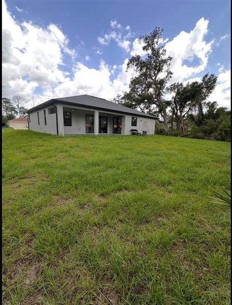 Exterior details and patio area of a home in , North Port (Image 4).