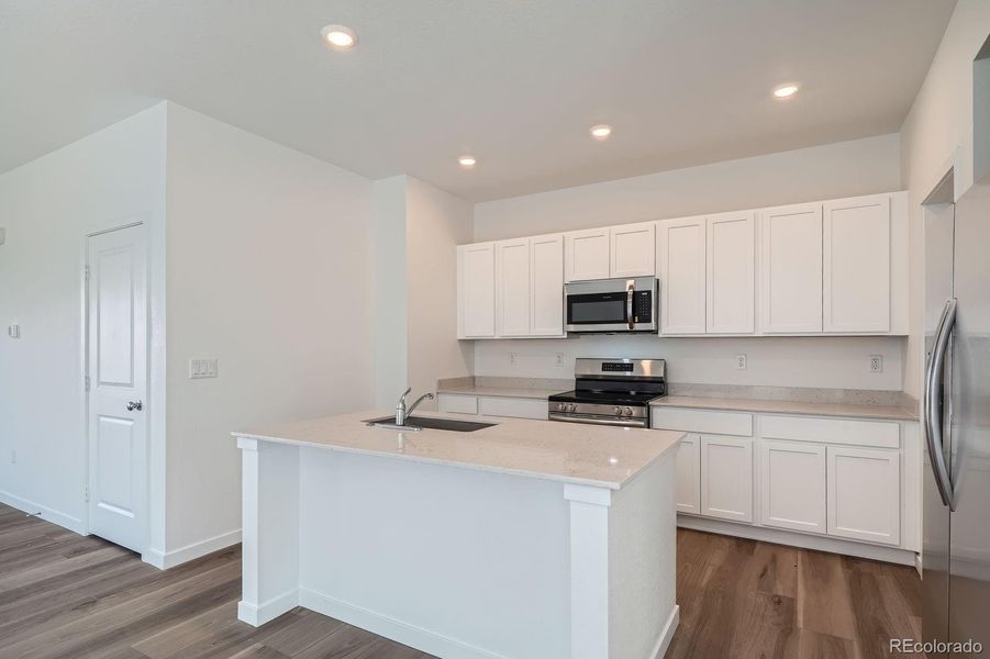 Furnished interior view inside a new home in Eastcreek Farm: Paired Homes, Thornton (Image 7).