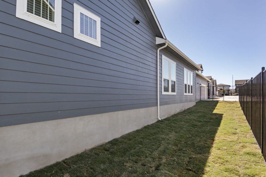 Exterior details and patio area of a home in Easton Park, Austin (Image 34).