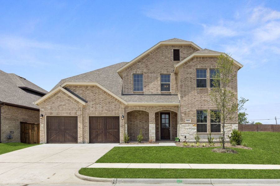 Representative exterior photo of a completed home built from the Kirby by UnionMain Homes in Lake Breeze, Lavon, TX (Image 27).
