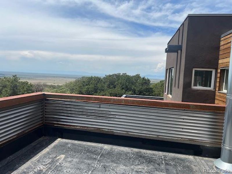 Exterior details and patio area of a home in , Crestone (Image 11). Exterior details and patio area of a home in , Crestone (Image 11).