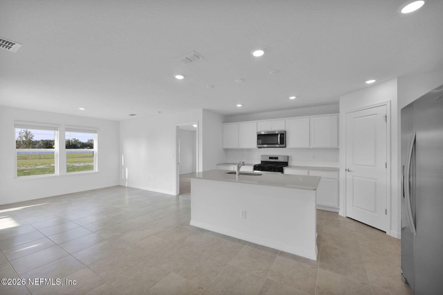 Furnished interior view inside a new home in Wells Landing, Jacksonville (Image 8).