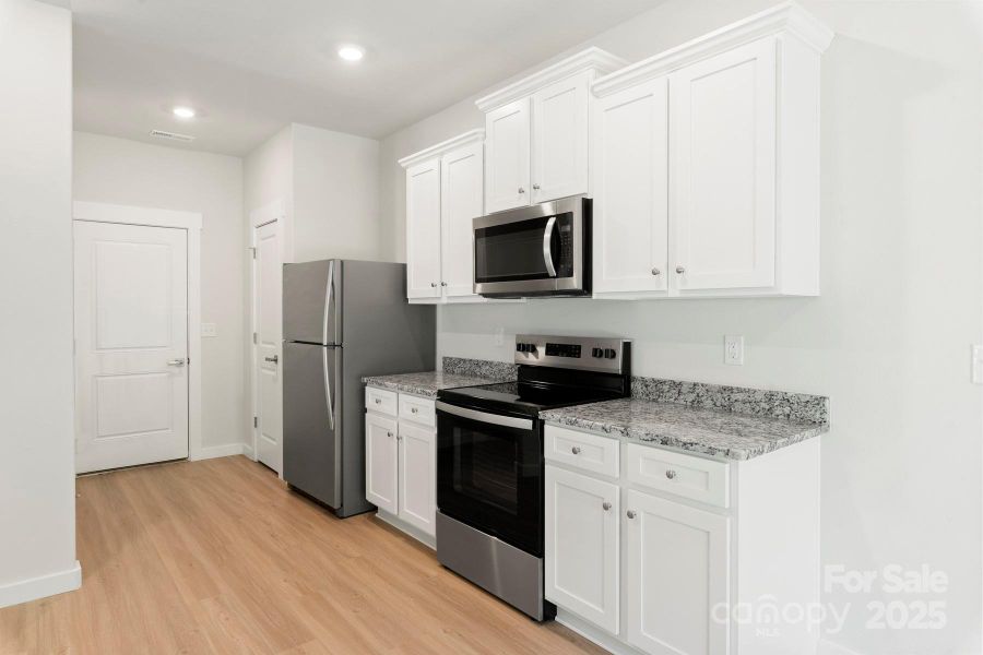 Furnished interior view inside a new home in Knights Bridge, Richburg (Image 3).