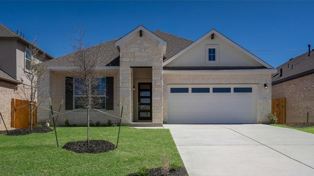 Front exterior of a new home in Rosenbusch Ranch, Leander, TX, highlighting curb appeal (Image 1). Front exterior of a new home in Rosenbusch Ranch, Leander, TX, highlighting curb appeal (Image 1).