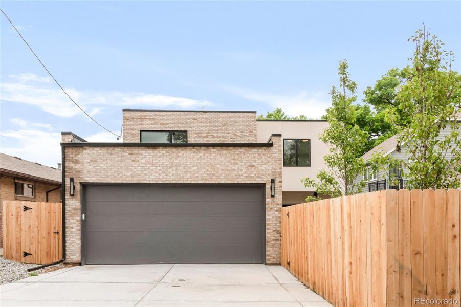 Front exterior of a new home in , Denver, CO, highlighting curb appeal (Image 2).