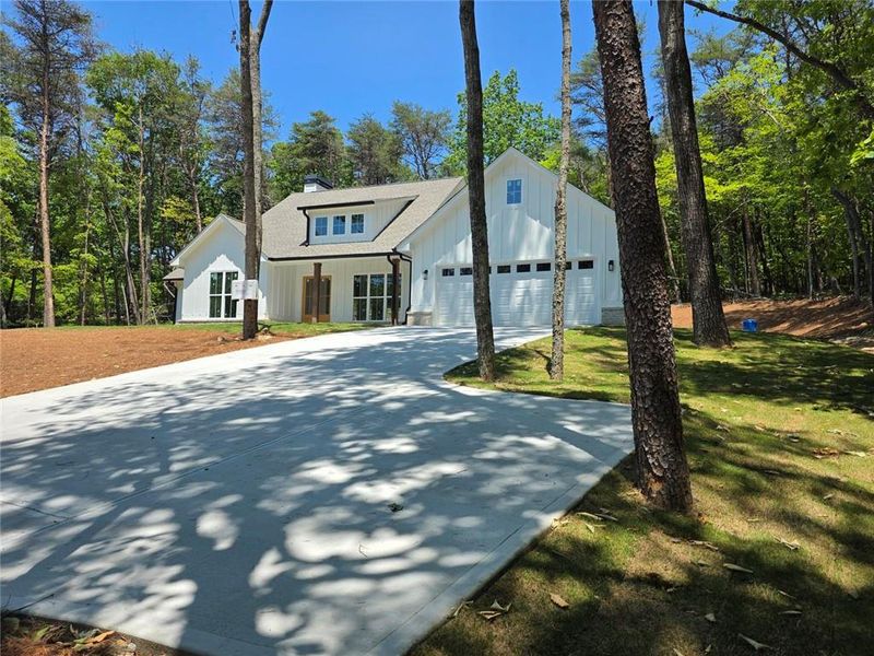 Front exterior of a new home in , Jasper, GA, highlighting curb appeal (Image 1). Front exterior of a new home in , Jasper, GA, highlighting curb appeal (Image 1).