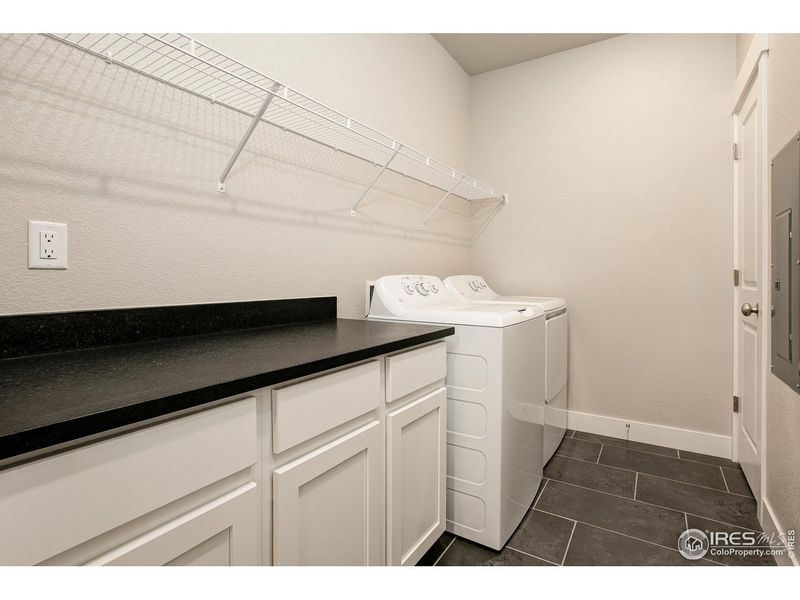 Furnished interior view inside a new home in Highlands at Fox Hill - The Flats, Longmont (Image 7).