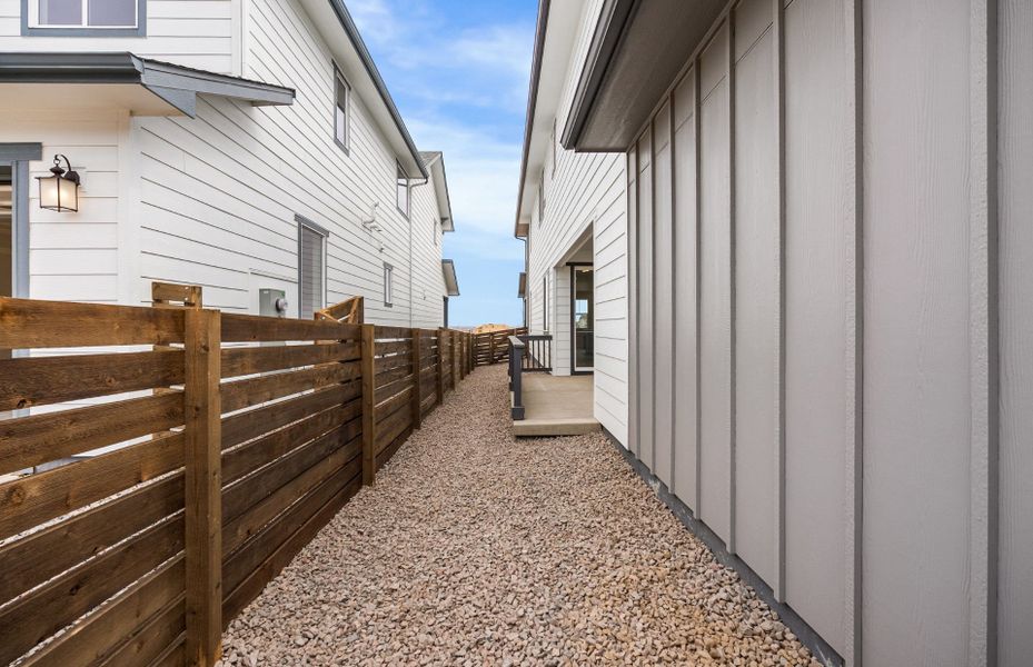 Exterior details and patio area of a home in Barefoot Village, Firestone (Image 29). Exterior details and patio area of a home in Barefoot Village, Firestone (Image 29).