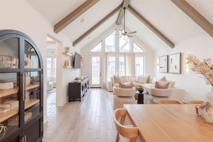 Cozy living area with large windows allowing natural light to flow in