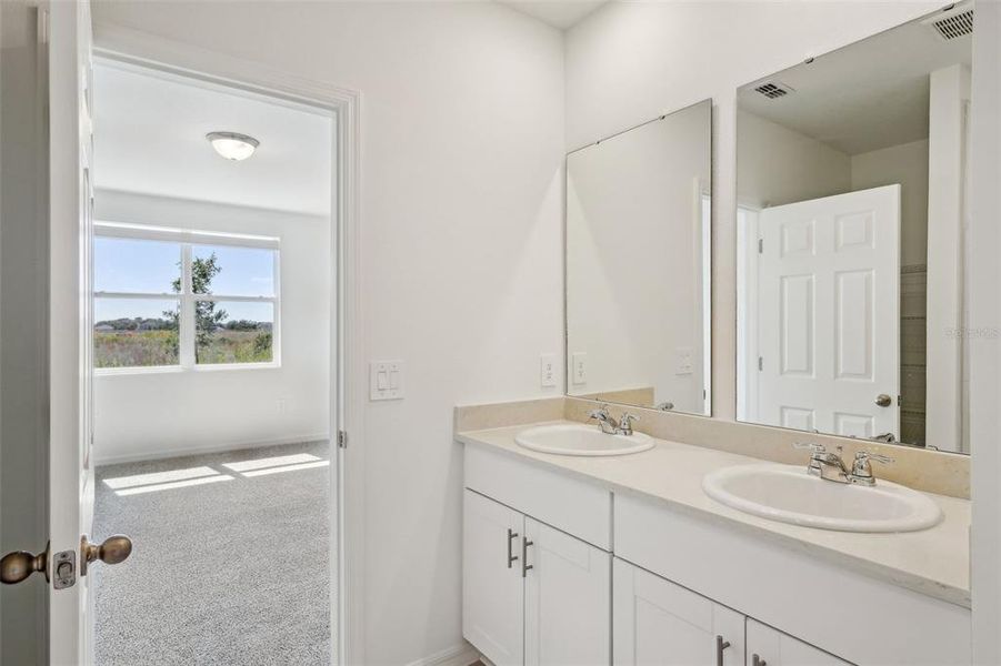 Furnished interior view inside a new home in Lake Deer Estates - Signature Series, Poinciana (Image 8). Furnished interior view inside a new home in Lake Deer Estates - Signature Series, Poinciana (Image 8).