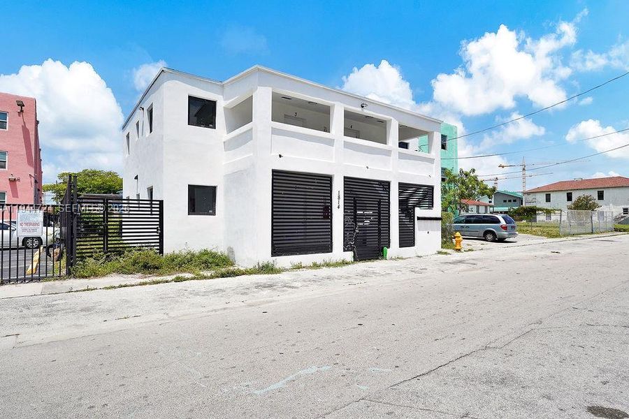 Front exterior of a new home in , Miami, FL, highlighting curb appeal (Image 21).