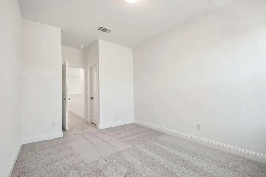 Spacious, unfurnished interior of a new home in 6 Creeks, Kyle (Image 14). Spacious, unfurnished interior of a new home in 6 Creeks, Kyle (Image 14).