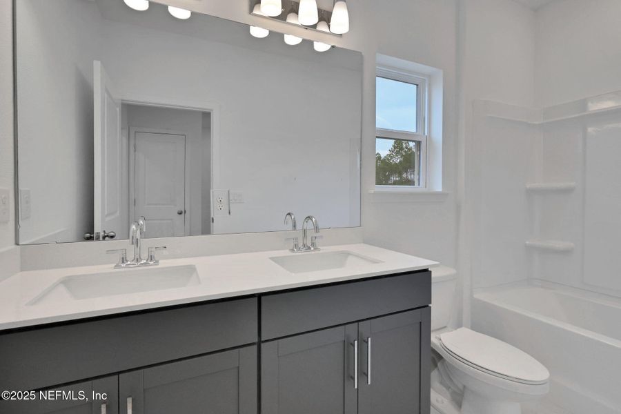 Furnished interior view inside a new home in Brook Forest - Single Family Homes, St. Augustine (Image 12). Furnished interior view inside a new home in Brook Forest - Single Family Homes, St. Augustine (Image 12).