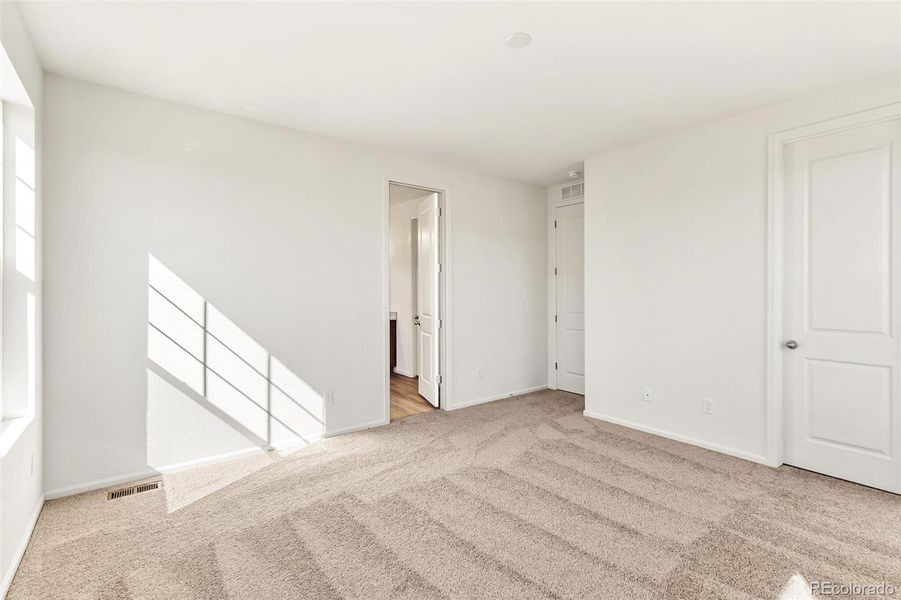 Spacious, unfurnished interior of a new home in Terrain Oak Valley, Castle Rock (Image 12).