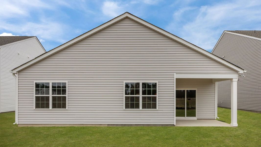 Exterior details and patio area of a home in Ridgewood Farms, Winterville (Image 23).