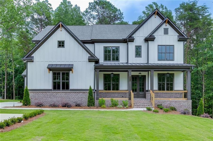 Front exterior of a new home in , Cumming, GA, highlighting curb appeal (Image 28). Front exterior of a new home in , Cumming, GA, highlighting curb appeal (Image 28).
