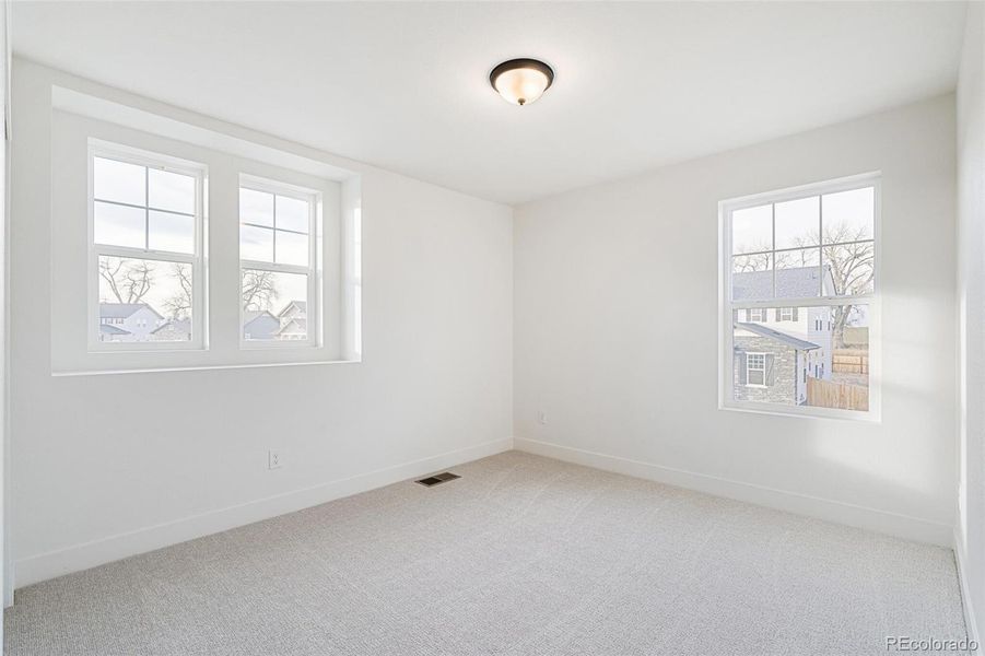 Spacious, unfurnished interior of a new home in Windsong, Thornton (Image 23).