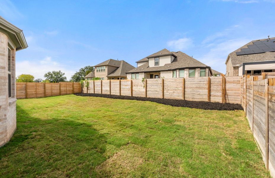 Exterior details and patio area of a home in Bluffview Reserve, Leander (Image 31).