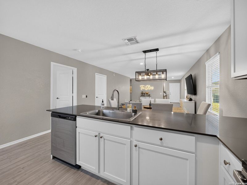 Furnished interior view inside a new home in Mission del Lago, San Antonio (Image 7).