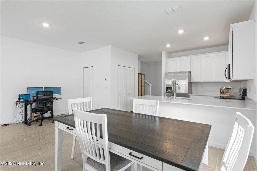 Furnished interior view inside a new home in Hardwick Farms: Hardwick Farms - Townhome Collection, Jacksonville (Image 9).