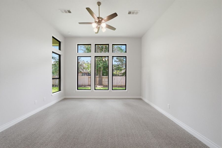 Spacious, unfurnished interior of a new home in The Woodlands Hills 65′, Willis (Image 36).