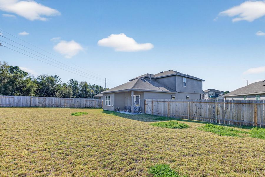 Exterior details and patio area of a home in , Houston (Image 3).