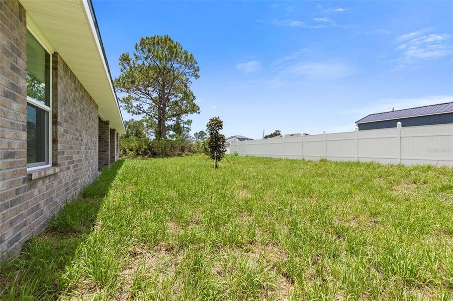 Exterior details and patio area of a home in , Palm Coast (Image 38).