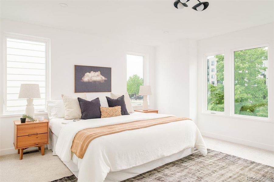 Generous, sunny primary bedroom