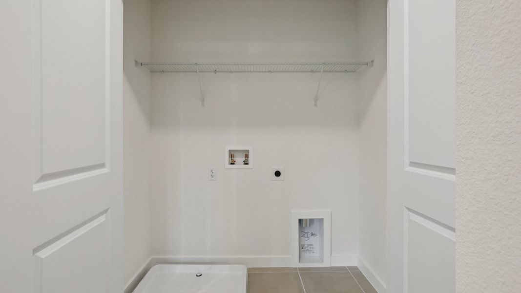 Laundry Room of the Coronado - End at Cyrene at Harmony located in St Cloud FL by DRB Homes