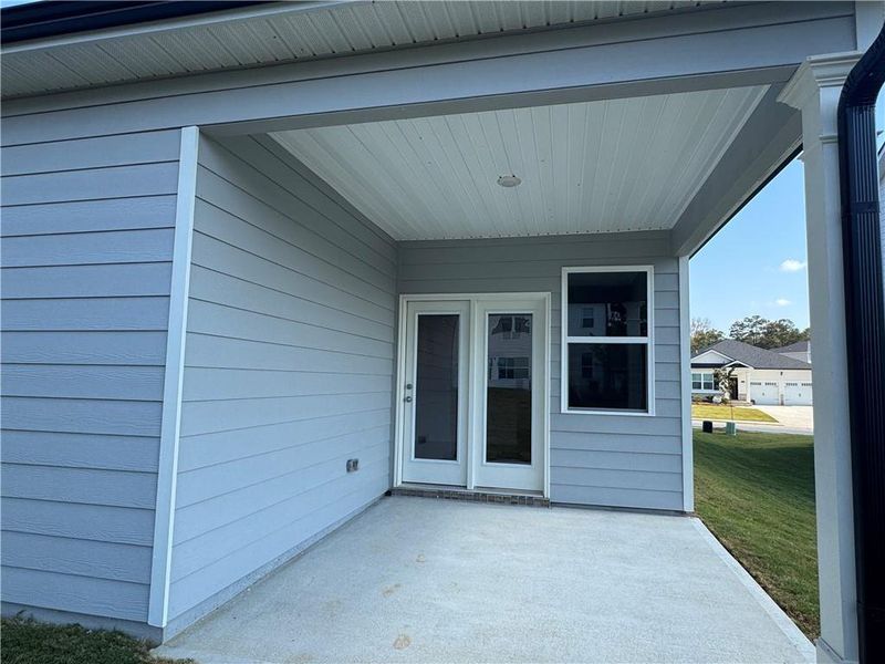 Exterior details and patio area of a home in Oakchase at Hampton, Hampton (Image 2).